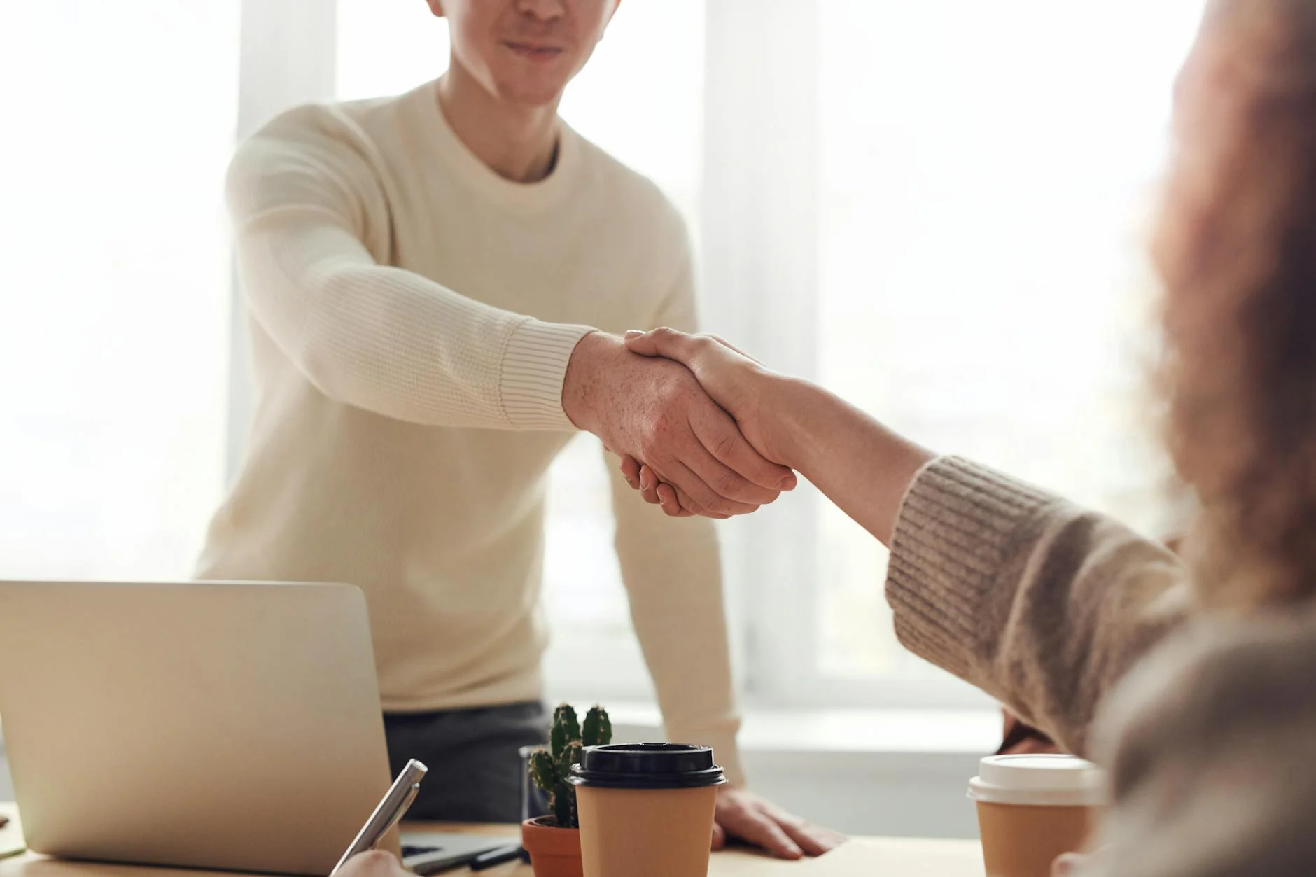 Handshake between a recruiter and a job candidate.